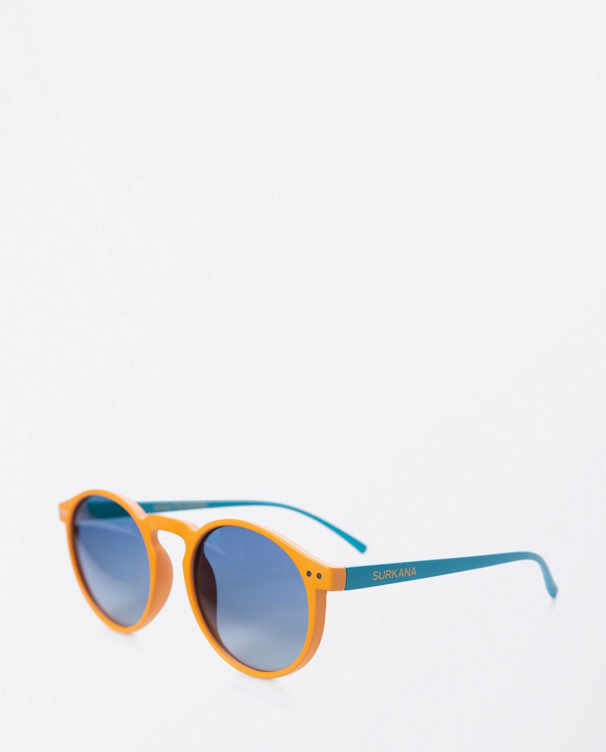Bicolor round sunglasses. Orange