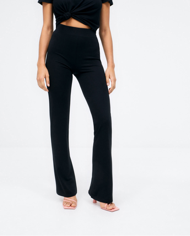 Long bell-bottom trousers....