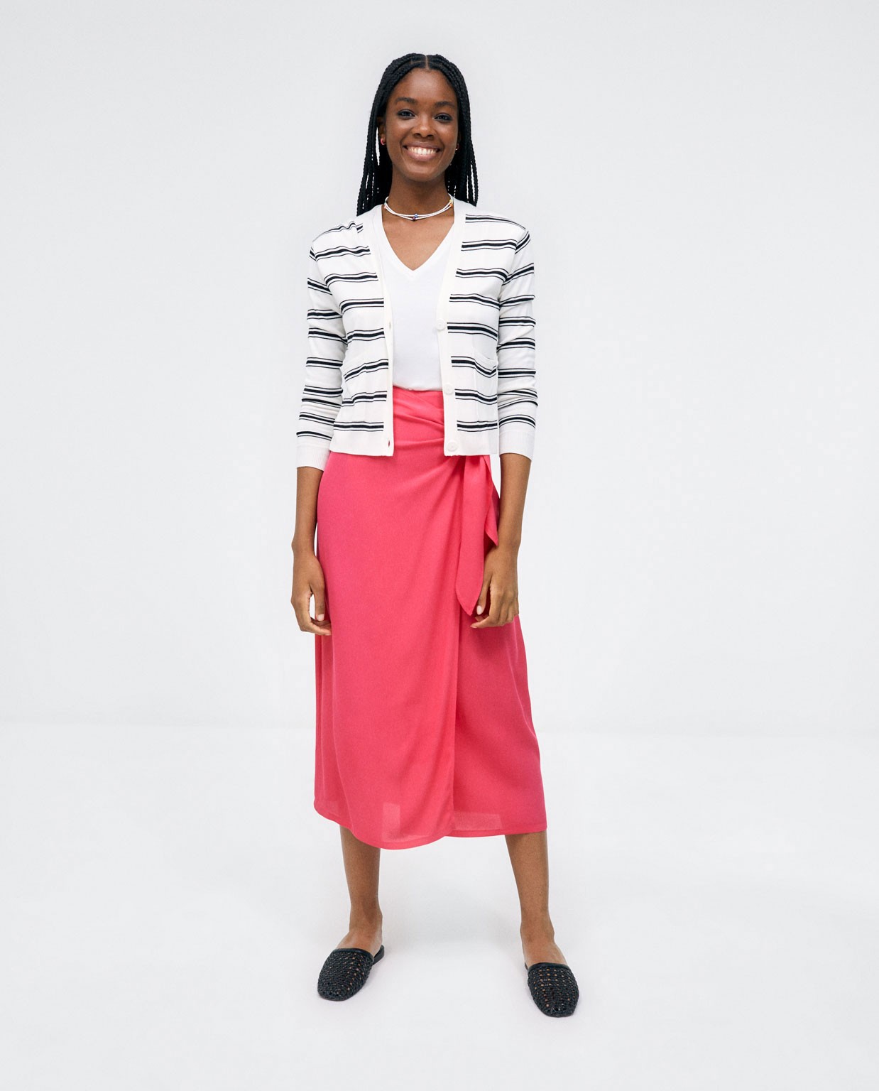 Cardigan in maglia con tasche. Strisce Nero