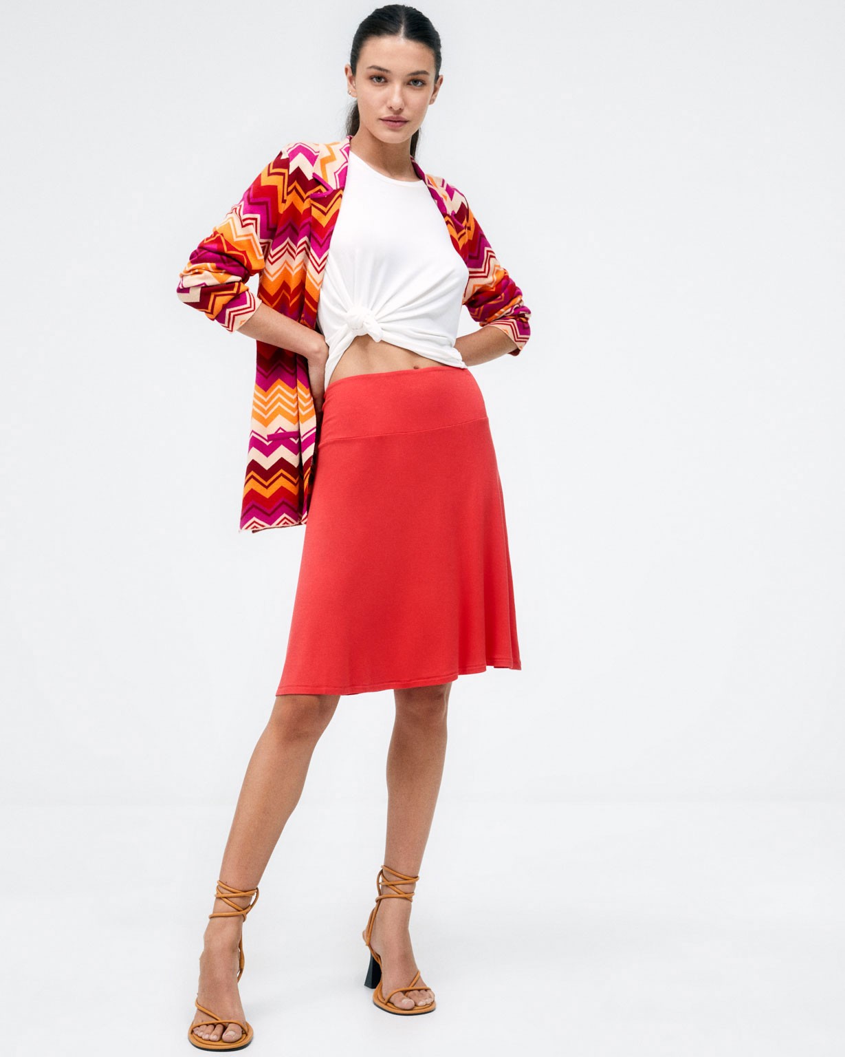 Giacca in maglia con tasche. Strisce  Fucsia