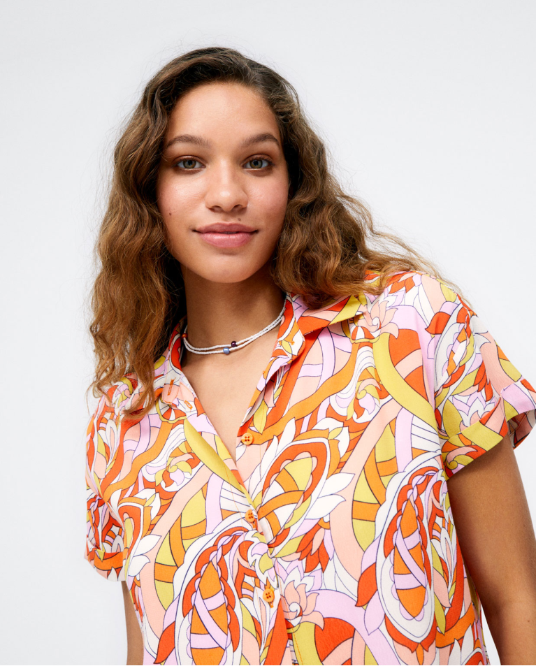Camicia lunga a maniche corte. Stampa Arancione