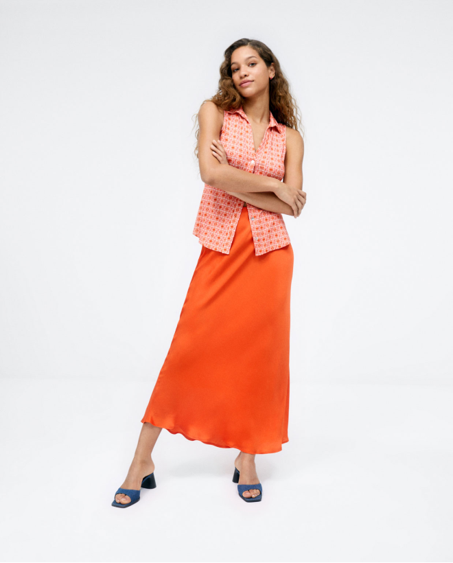 Camicia senza maniche con maniche arricciate. Elas Arancione