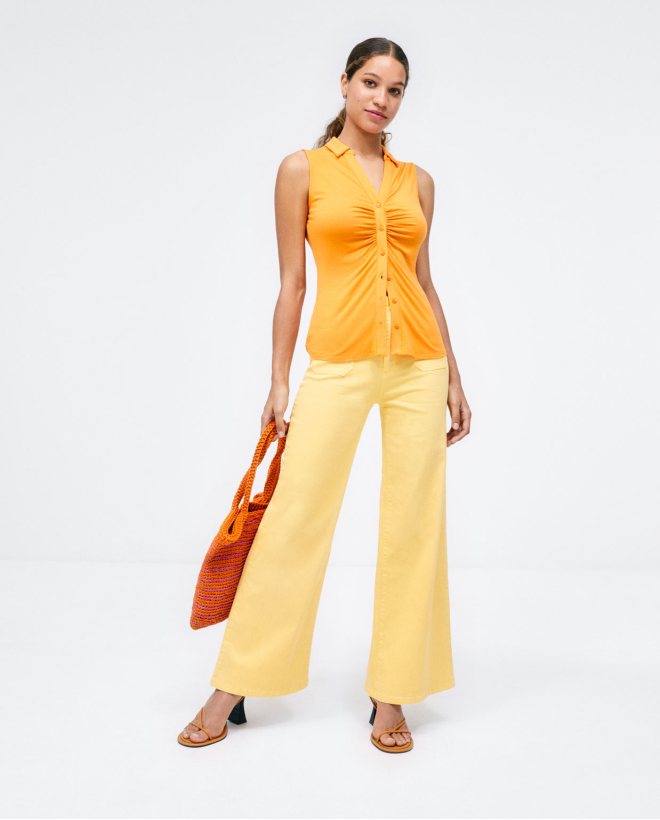 Gathe sleeveless shirt....